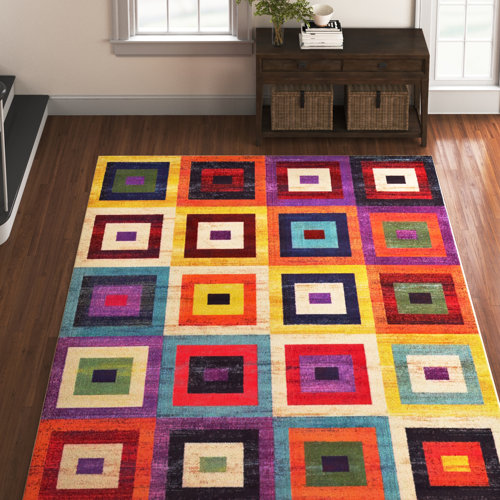 Wade Logan® Jesusae Geometric Blue/Purple/Orange Area Rug & Reviews